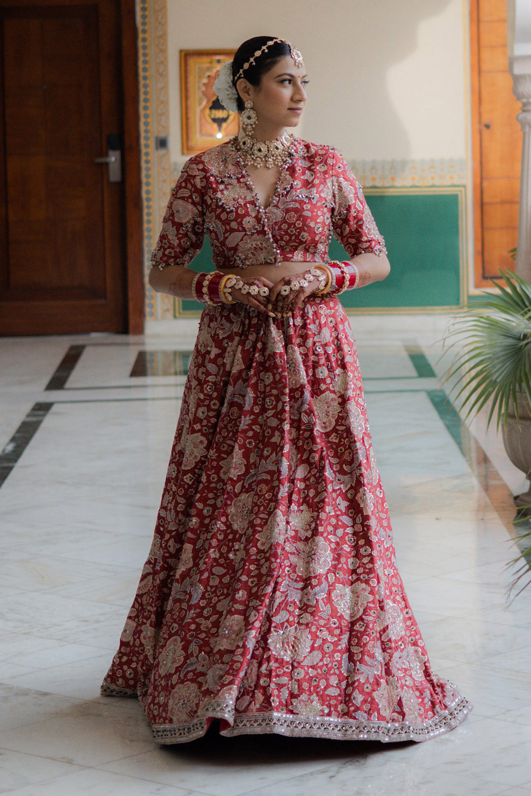 SWASTIKA IN STARLET LEHENGA SET