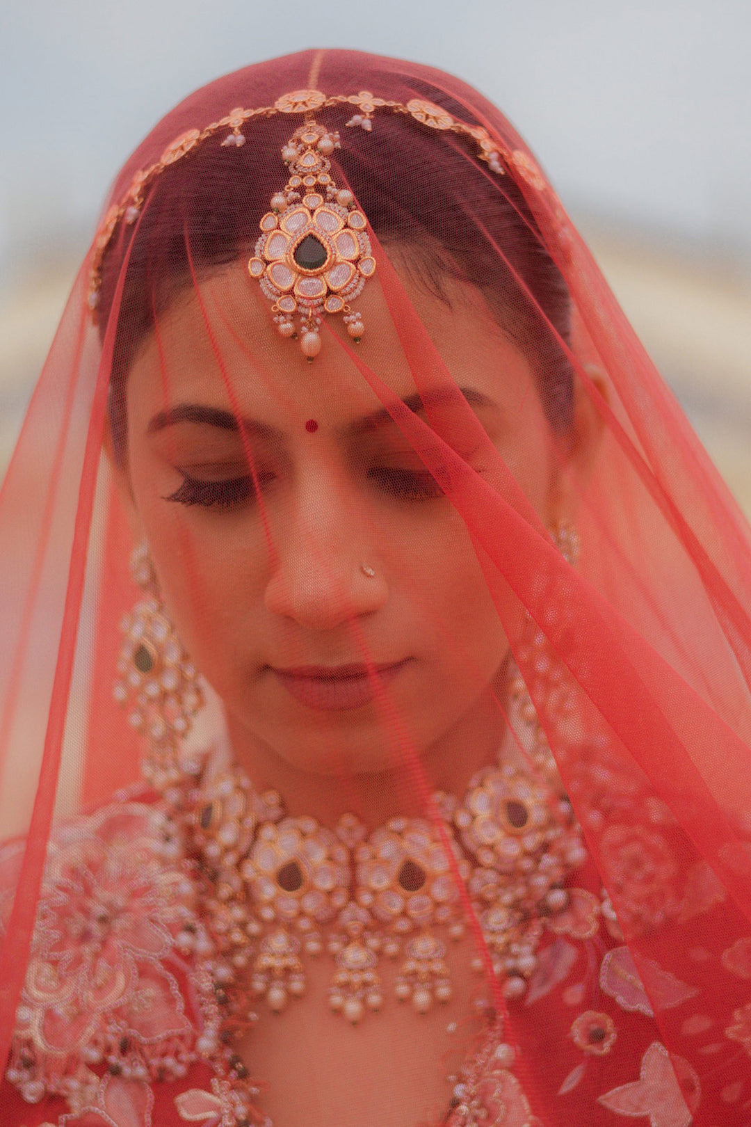 SWASTIKA IN STARLET LEHENGA SET