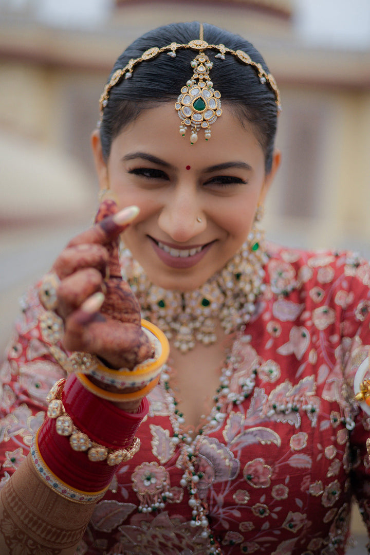 SWASTIKA IN STARLET LEHENGA SET