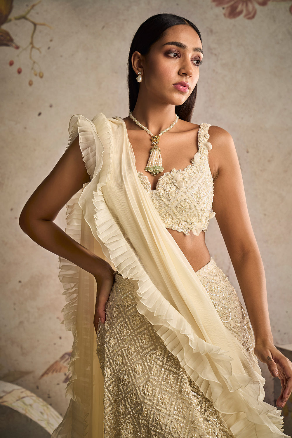 Ridhi-mehra-Ivory Net Embroidered Blouse and Heavy Embroidered Skirt Paired With Chiffon Organza Drape