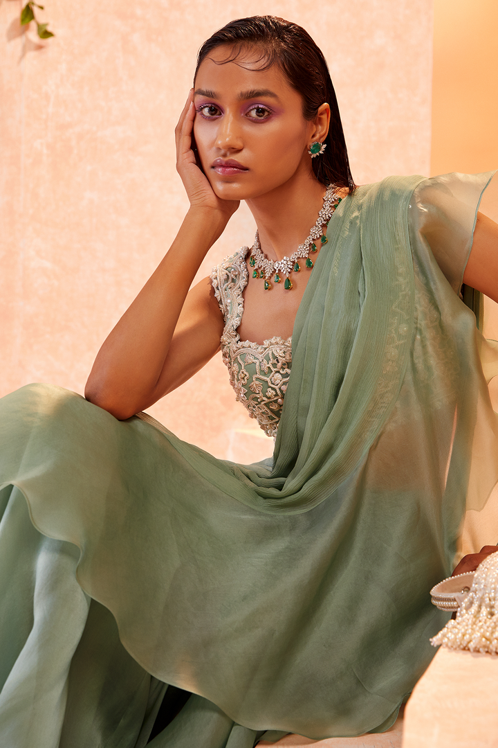 RIDHI-MEHRA-Sea green net embroidered blouse and chiffon-organza draped ruffle saree